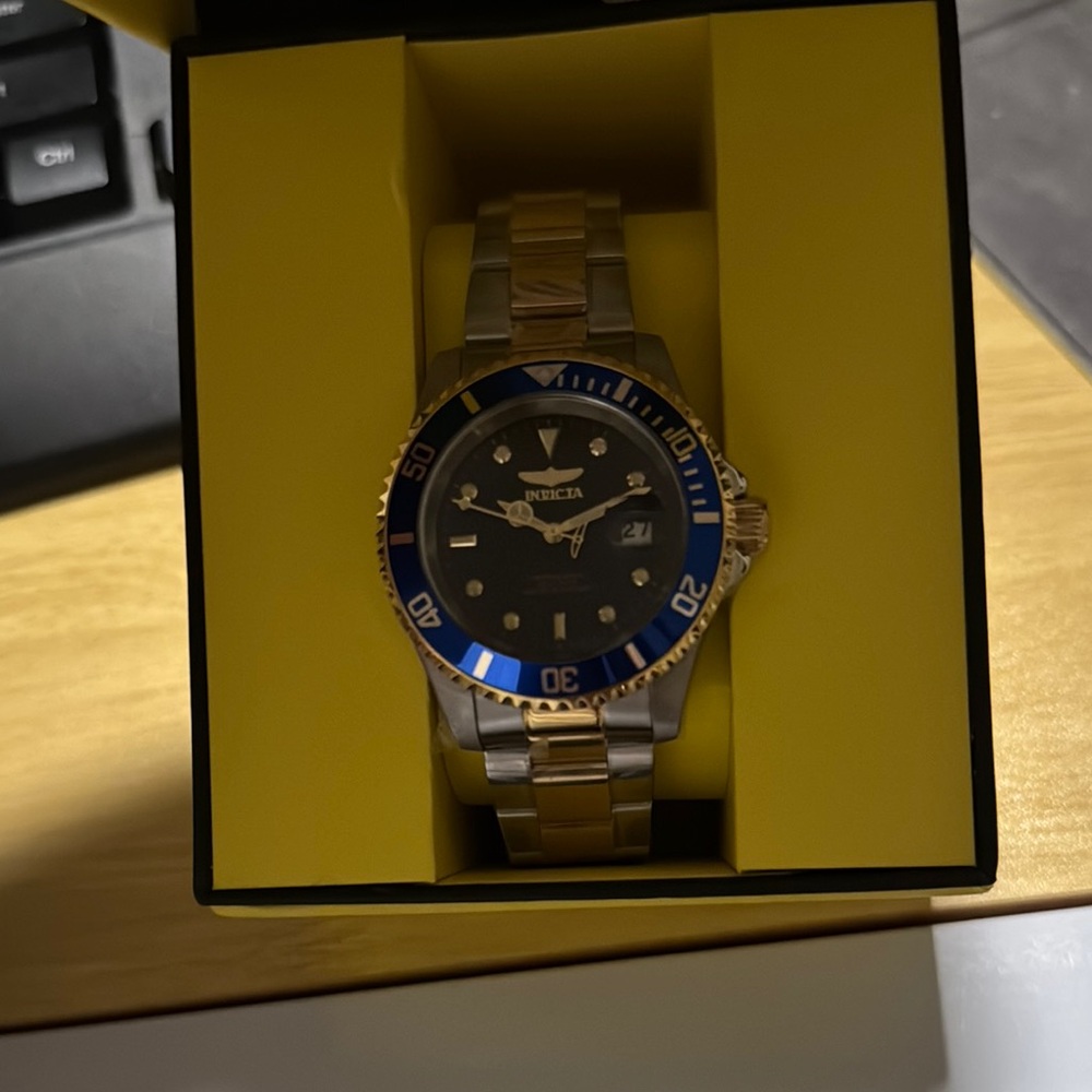 Invicta Gold and Silver Watch with Blue Accents